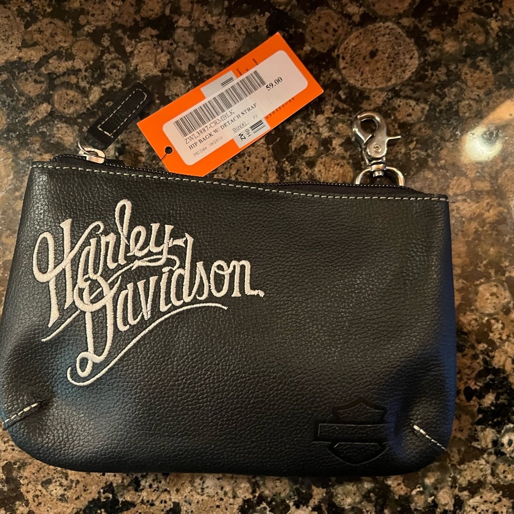 Brand new Harley Davidson clutch purse with a strap